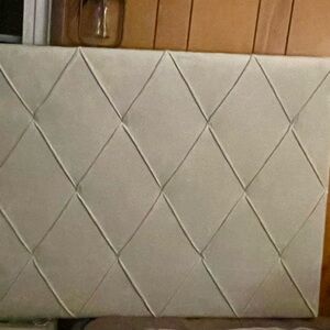 Tuffed headboard, with charging station. twin/full bed size.